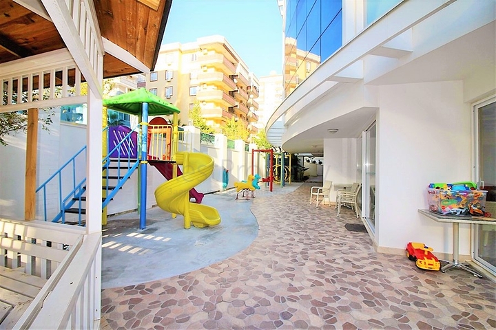 ضمن مجمع فاخر - شقة غرفة وصالة مؤثثة - قريبة من البحر - في مهموتلار / الانيا 