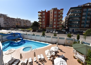 ضمن مجمع فاخر - شقة غرفة وصالة مؤثثة - قريبة من البحر - في مهموتلار / الانيا 