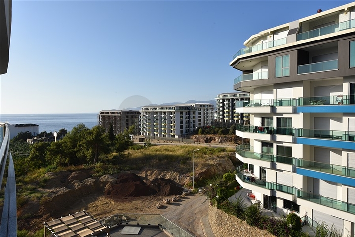 اطلالة بحر -شقة مؤثثة - غرفة وصالة -في مجمع 5 نجوم -كارجي جاك / الانيا 