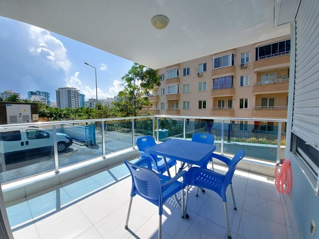 بسعر مناسب - شقة مؤثثة من تصميم 1+2 غرفتين وصالة - ضمن مجمع سكني - في مهموتلار / الانيا 