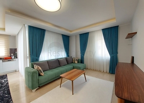 بسعر مناسب - شقة مؤثثة من تصميم 1+2 غرفتين وصالة - ضمن مجمع سكني - في مهموتلار / الانيا 