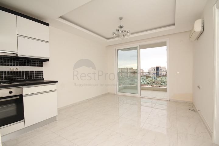 طابق مرتفع - شقة غرفة وصالة - ضمن مجمع سكني - في مهموتلار / الانيا 