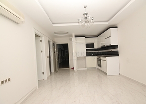 طابق مرتفع - شقة غرفة وصالة - ضمن مجمع سكني - في مهموتلار / الانيا 