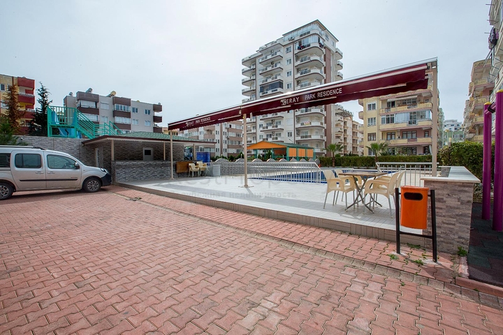 طابق مرتفع - شقة انيقة من تصميم 1+1 - ضمن مجمع - في مهموتلار / الانيا 