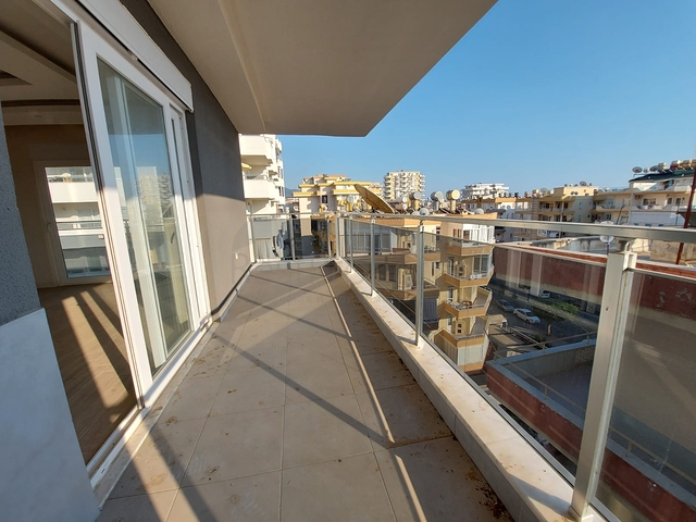 قريبة من البحر والمركز - شقة غرفتين وصالة -بدون فرش - في مهموتلار / الانيا 