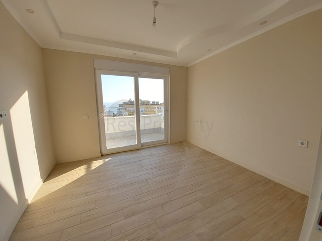 قريبة من البحر والمركز - شقة غرفتين وصالة -بدون فرش - في مهموتلار / الانيا 