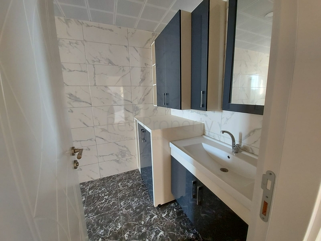 قريبة من البحر والمركز - شقة غرفتين وصالة -بدون فرش - في مهموتلار / الانيا 