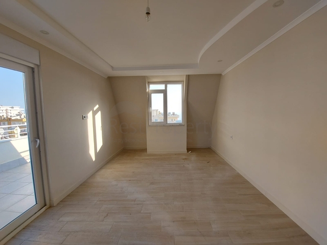 قريبة من البحر والمركز - شقة غرفتين وصالة -بدون فرش - في مهموتلار / الانيا 