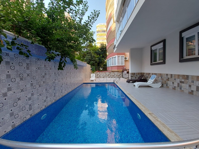 قريبة من البحر والمركز - شقة غرفتين وصالة -بدون فرش - في مهموتلار / الانيا 