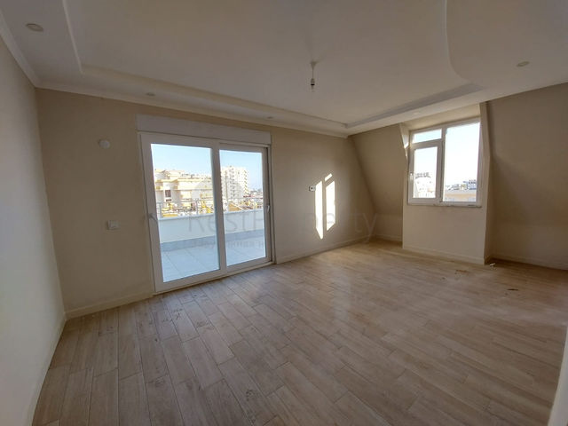 قريبة من البحر والمركز - شقة غرفتين وصالة -بدون فرش - في مهموتلار / الانيا 