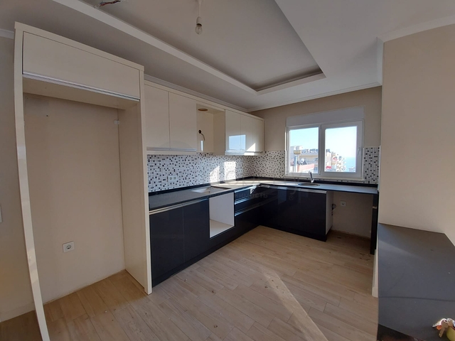 قريبة من البحر والمركز - شقة غرفتين وصالة -بدون فرش - في مهموتلار / الانيا 