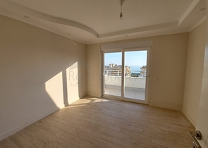 قريبة من البحر والمركز - شقة غرفتين وصالة -بدون فرش - في مهموتلار / الانيا 