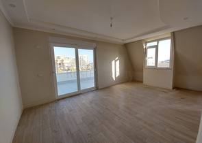 قريبة من البحر والمركز - شقة غرفتين وصالة -بدون فرش - في مهموتلار / الانيا 