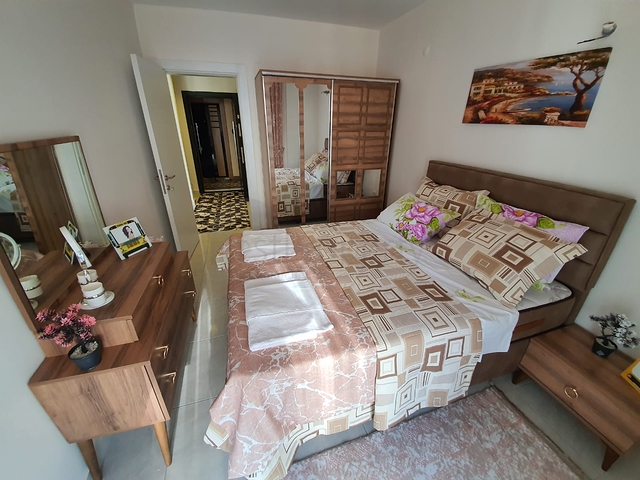 شقة فاخرة - مؤثثة - تصميم 1+1 - ضمن مجمع فاخر قريب من البحر - في مهموتلار / الانيا 