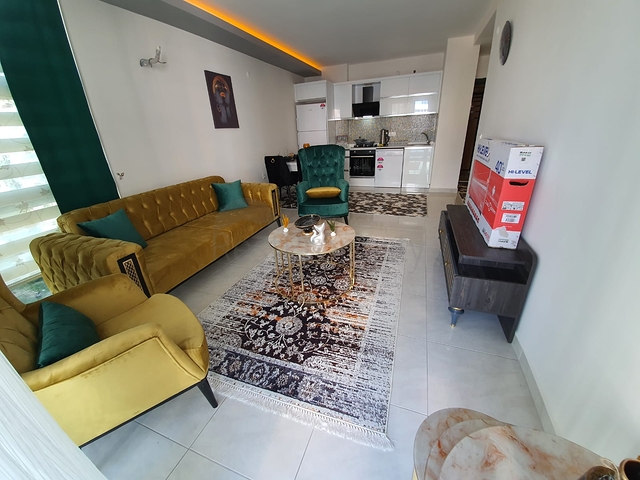 شقة فاخرة - مؤثثة - تصميم 1+1 - ضمن مجمع فاخر قريب من البحر - في مهموتلار / الانيا 