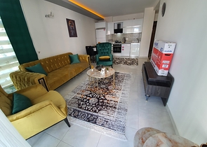 شقة فاخرة - مؤثثة - تصميم 1+1 - ضمن مجمع فاخر قريب من البحر - في مهموتلار / الانيا 