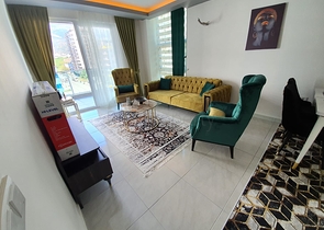 شقة فاخرة - مؤثثة - تصميم 1+1 - ضمن مجمع فاخر قريب من البحر - في مهموتلار / الانيا 