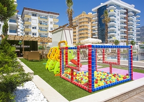 شقة فاخرة - مؤثثة - تصميم 1+1 - ضمن مجمع فاخر قريب من البحر - في مهموتلار / الانيا 