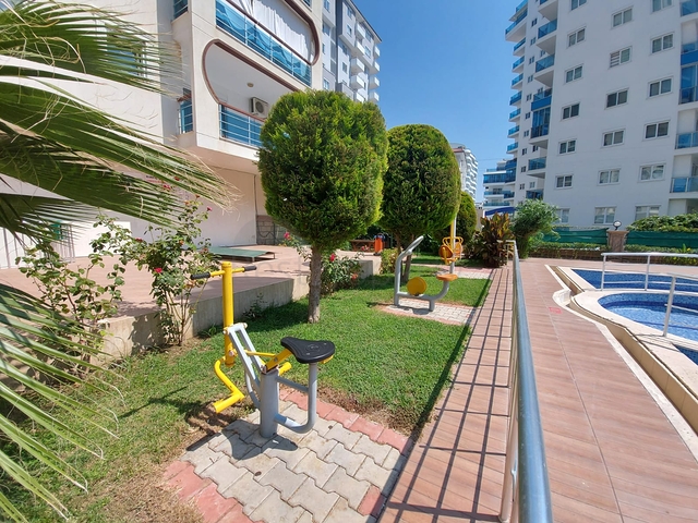 شقة مؤثثة - غرفة وصالة - ضمن مجمع سكني قريب من البحر - في مهموتلار / الانيا 