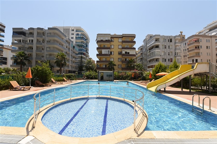 شقة مؤثثة - غرفة وصالة - ضمن مجمع سكني قريب من البحر - في مهموتلار / الانيا 