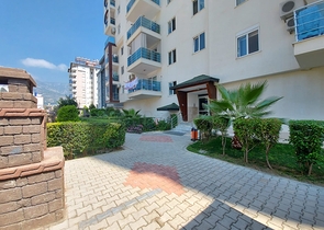 شقة مؤثثة - غرفة وصالة - ضمن مجمع سكني قريب من البحر - في مهموتلار / الانيا 