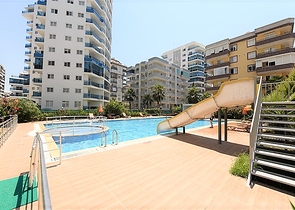 شقة مؤثثة - غرفة وصالة - ضمن مجمع سكني قريب من البحر - في مهموتلار / الانيا 