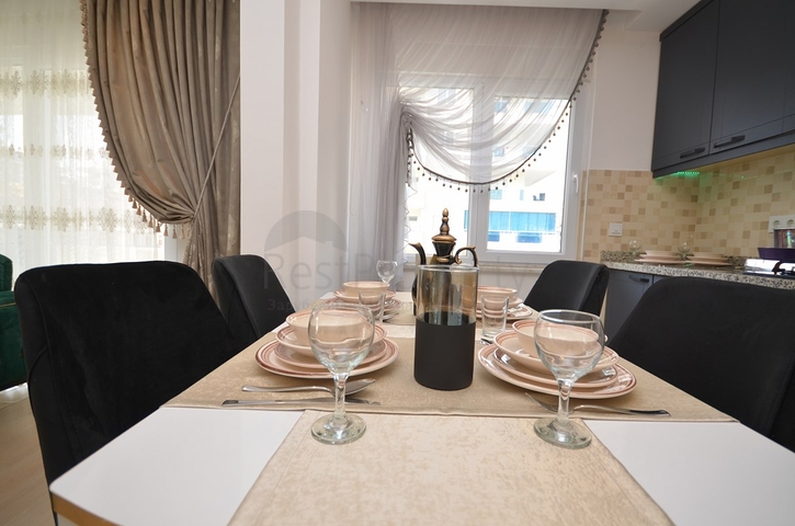 شقة مفروشة - تصميم غرفتين وصالة - 200 م عن البحر - في مهموتلار / الانيا 