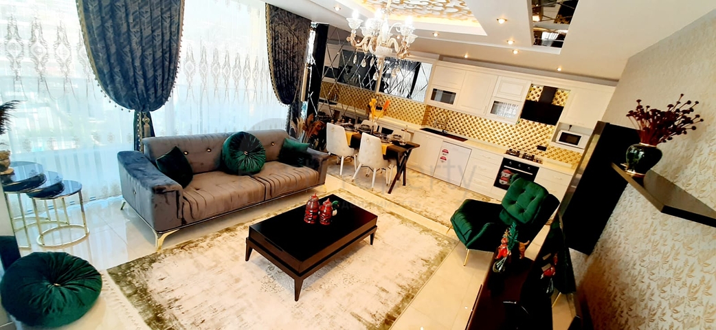 على البحر مباشرة - شقة فاخرة - تصميم غرفتين وصالة - مجمع فاخر - في مهموتلار / الانيا 