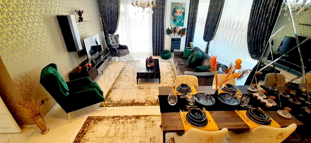 على البحر مباشرة - شقة فاخرة - تصميم غرفتين وصالة - مجمع فاخر - في مهموتلار / الانيا 