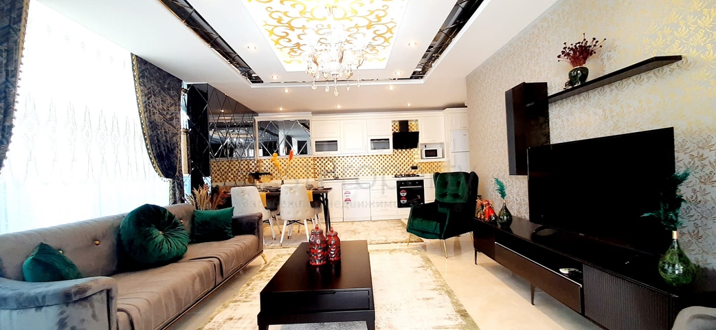 على البحر مباشرة - شقة فاخرة - تصميم غرفتين وصالة - مجمع فاخر - في مهموتلار / الانيا 