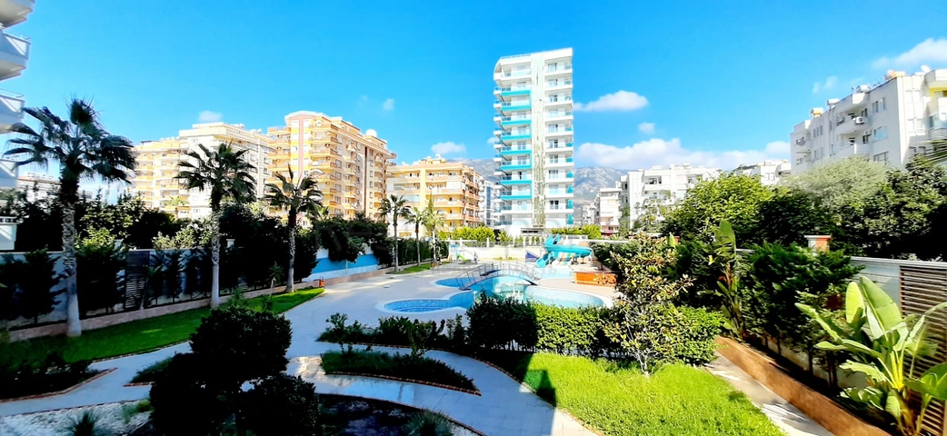 على البحر مباشرة - شقة فاخرة - تصميم غرفتين وصالة - مجمع فاخر - في مهموتلار / الانيا 