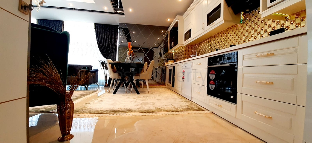 على البحر مباشرة - شقة فاخرة - تصميم غرفتين وصالة - مجمع فاخر - في مهموتلار / الانيا 