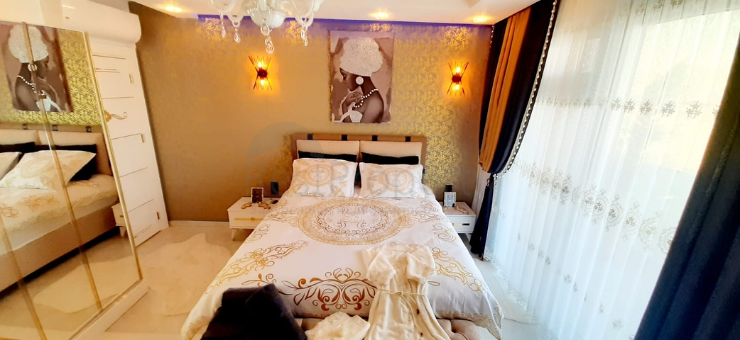 على البحر مباشرة - شقة فاخرة - تصميم غرفتين وصالة - مجمع فاخر - في مهموتلار / الانيا 