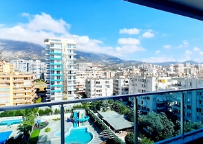 على البحر مباشرة - شقة فاخرة - تصميم غرفتين وصالة - مجمع فاخر - في مهموتلار / الانيا 