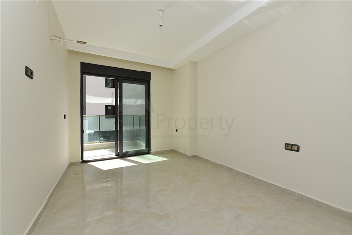 ضمن مجمع على البحر مباشرة - شقة غرفتين وصالة - ضمن مجمع - في مهموتلار / الانيا 