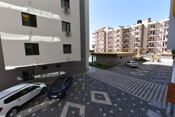 ضمن مجمع على البحر مباشرة - شقة غرفتين وصالة - ضمن مجمع - في مهموتلار / الانيا 