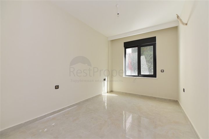 ضمن مجمع على البحر مباشرة - شقة غرفتين وصالة - ضمن مجمع - في مهموتلار / الانيا 