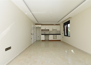 ضمن مجمع على البحر مباشرة - شقة غرفتين وصالة - ضمن مجمع - في مهموتلار / الانيا 