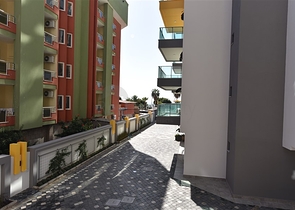 ضمن مجمع على البحر مباشرة - شقة غرفتين وصالة - ضمن مجمع - في مهموتلار / الانيا 