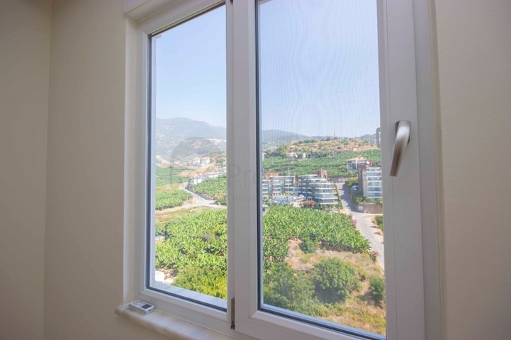 اطلالة جبلية خلابة - شقة عائلية 2 غرفة وصالة - ضمن مجمع سكني في منطقة هادئة وقريبة من المركز - جيكجلي / الانيا