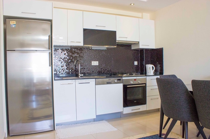 ضمن مجمع 5 نجوم -شقة غرفة وصالة مفروشة - في منطقة اوبا المركزية / الانيا 