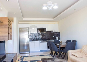 ضمن مجمع 5 نجوم -شقة غرفة وصالة مفروشة - في منطقة اوبا المركزية / الانيا 