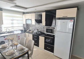 شقة غرفة وصالة - مفروشة - طابق مرتفع - ضمن مجمع - في مهموتلار / الانيا 