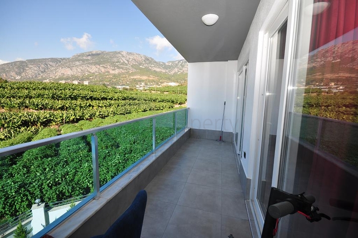 اطلالة جبلية خضراء - شقة غرفة وصالة مفروشة - ضمن مجمع سكني حديث - في مهموتلار / الانيا 