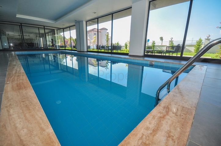 اطلالة جبلية خضراء - شقة غرفة وصالة مفروشة - ضمن مجمع سكني حديث - في مهموتلار / الانيا 