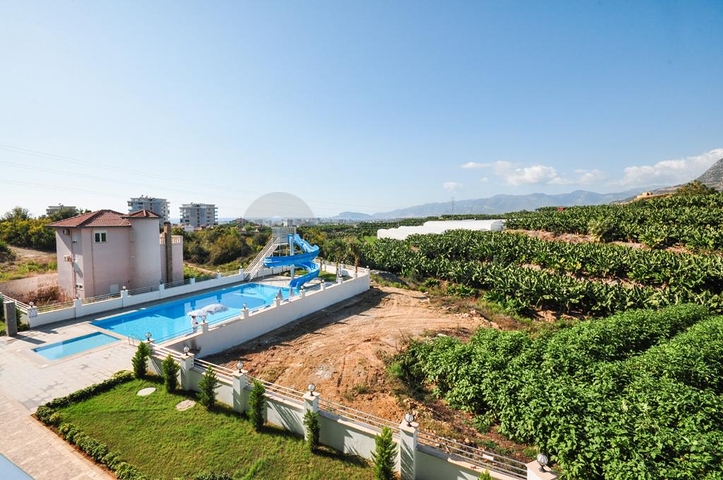 اطلالة جبلية خضراء - شقة غرفة وصالة مفروشة - ضمن مجمع سكني حديث - في مهموتلار / الانيا 