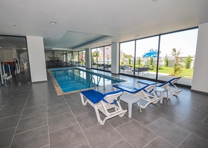 اطلالة جبلية خضراء - شقة غرفة وصالة مفروشة - ضمن مجمع سكني حديث - في مهموتلار / الانيا 