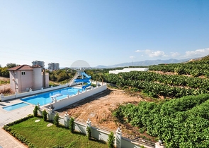 اطلالة جبلية خضراء - شقة غرفة وصالة مفروشة - ضمن مجمع سكني حديث - في مهموتلار / الانيا 