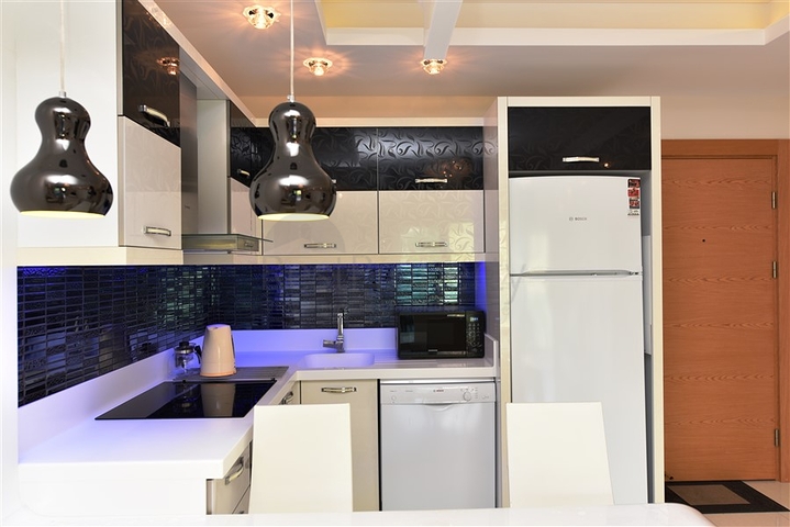 اسكن ضمن مجمع فاخر - شقة مؤثثة تصميم 1+1 - في مهموتلار /الانيا 