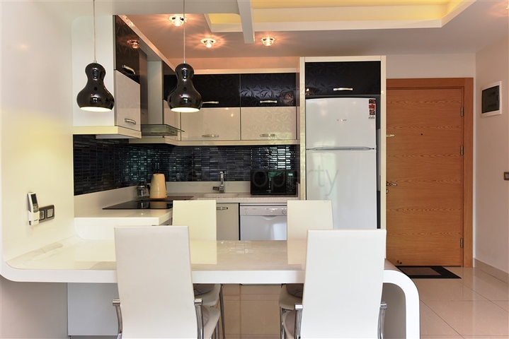 اسكن ضمن مجمع فاخر - شقة مؤثثة تصميم 1+1 - في مهموتلار /الانيا 